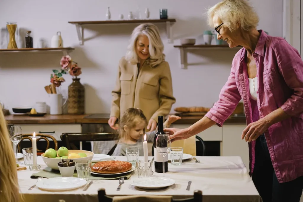A joyful family dinner with three generations enjoying a meal together